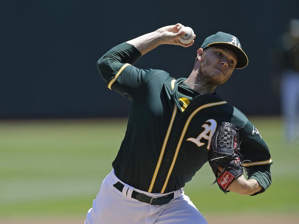 Oakland Athletics pitcher Sonny Gray works against the Tampa Bay Rays in the first inning Wednesday, July 19, 2017, in Oakland. (AP Photo/Ben Margot)