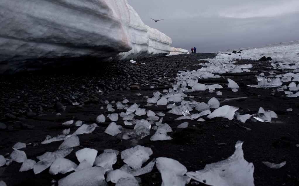 In this Jan. 26, 2015 photo, pieces of thawing ice are scattered along the beachshore at Punta Hanna, Livingston Island, in the Antarctica. The countries that decide the fate of Antarctica agreed on Friday to create the world's largest marine protected area in the ocean next to the frozen continent. The agreement comes after years of diplomatic wrangling and high-level talks between the U.S. and Russia, which has rejected the idea in the past.(AP Photo/Natacha Pisarenko)