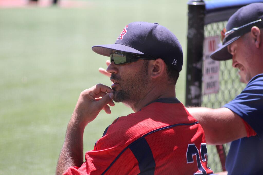 SRJC baseball coach Ben Buecnher watches as his team finishes off Modesto College in a two-game sweep in the first round of the NorCal regional playoffs. (Albert Gregory / for The Press Democrat)