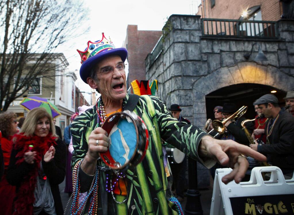 Tim Eschliman leading the Mardi Gras parade through downtown Petaluma in 2017.(CRISSY PASCUAL/ARGUS-COURIER STAFF)