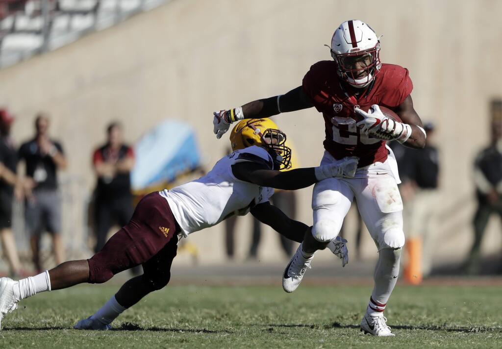 Stanford running back Bryce Love, right, runs against Arizona State during the second half Saturday, Sept. 30, 2017, in Stanford. (AP Photo/Marcio Jose Sanchez)