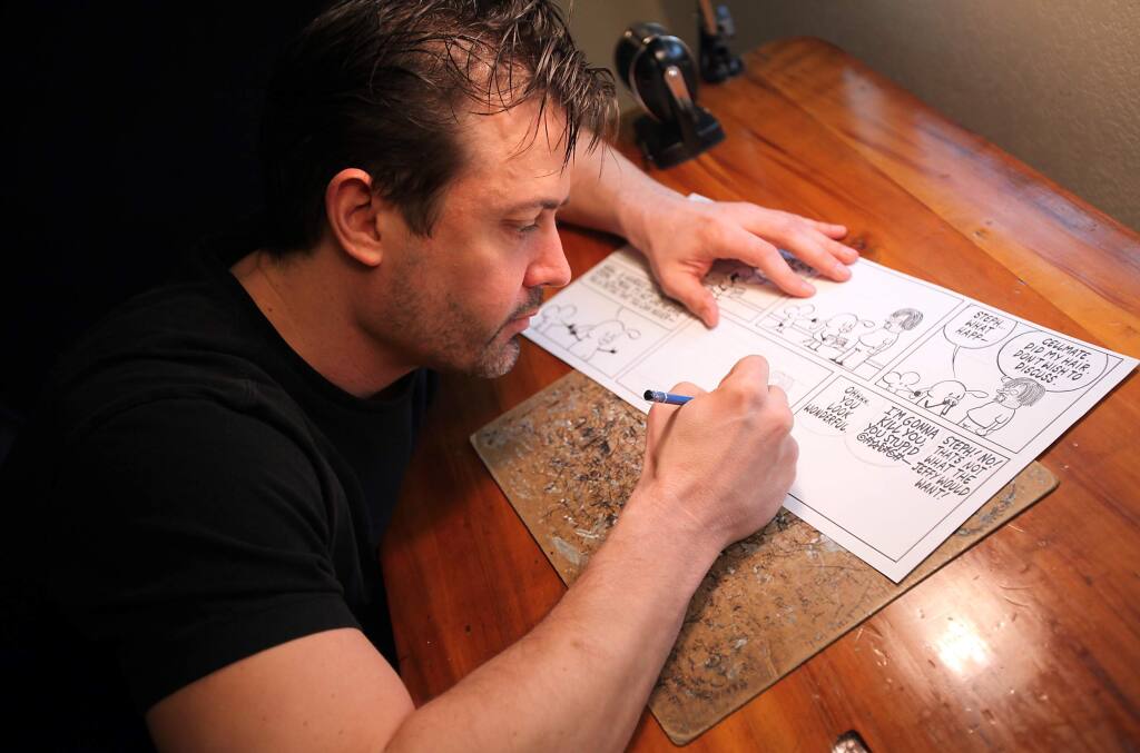 Cartoonist Stephan Pastis works on his “Pearls Before Swine” comic strip in his Santa Rosa studio office in 2011. (CHRISTOPHER CHUNG/ PD FILE)