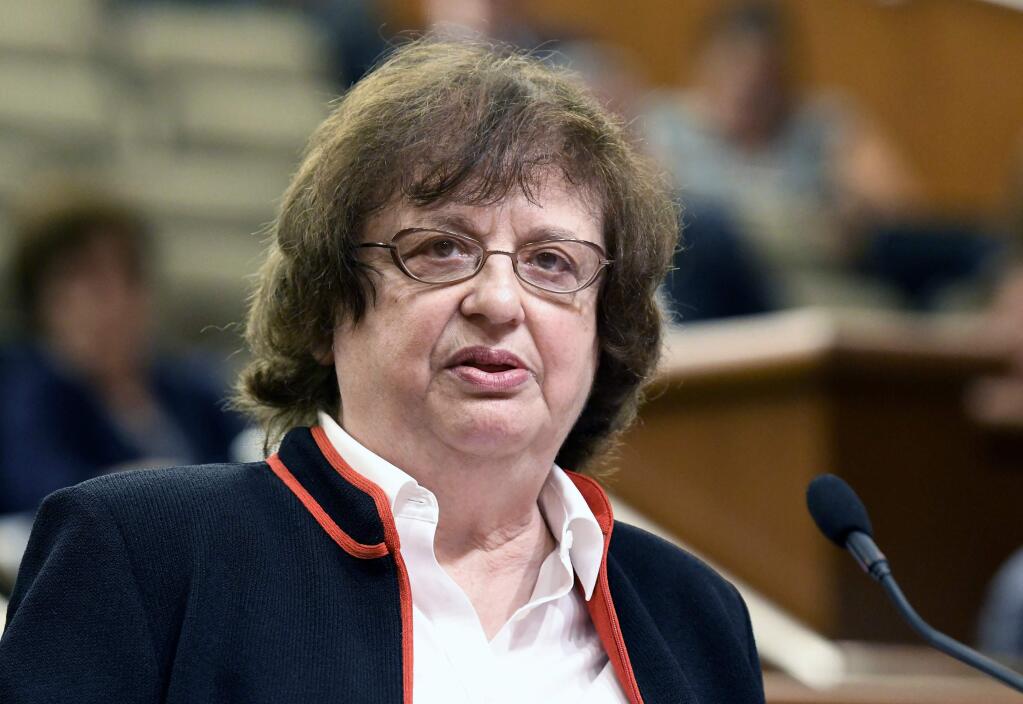 FILE - In this May 15, 2018, file photo, Barbara Underwood speaks to legislative leaders in Albany, N.Y., interviewing her for the office of New York Attorney General to replace Attorney General Eric Schneiderman who resigned amid domestic abuse allegations. President Donald Trump's charitable foundation has reached a deal to dissolve amid a legal battle with New York's attorney general Underwood. Underwood and the foundation filed a joint stipulation with the court Tuesday, Dec. 18, laying out a process for shutting down the charity and distributing its remaining assets to other nonprofit groups. (AP Photo/Hans Pennick, File)