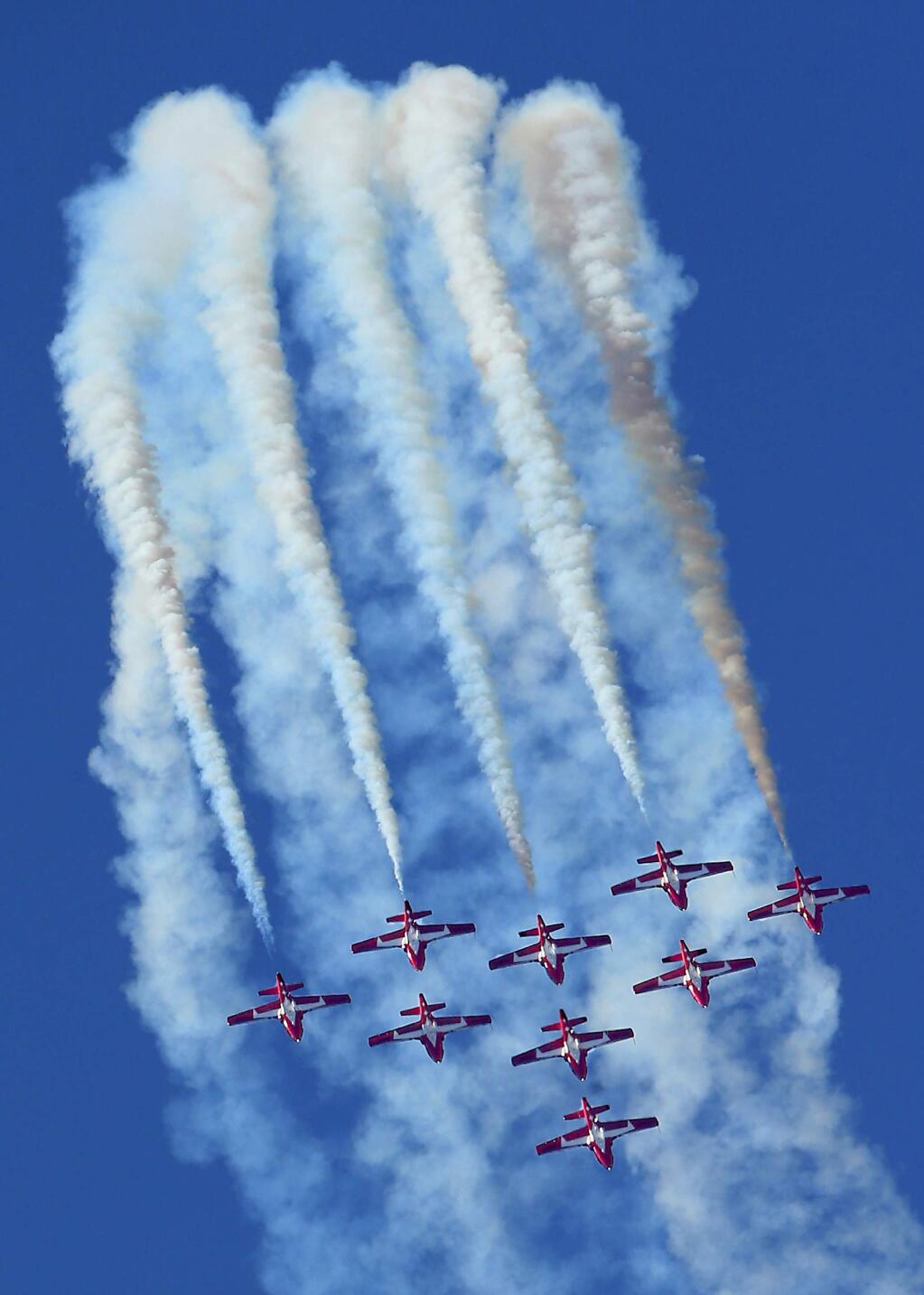The Canadian Forces Snowbirds in formation for the finale at the Wings Over Wine County Airshow 2015 at the Charles M. Schulz Sonoma County Airport on Saturday. (JOHN BURGESS / The Press Democrat)