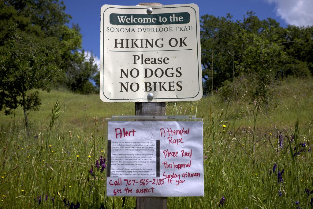 A sign has been added to the Sonoma Overlook Trail sign after a woman was reportedly raped in the area. (Nick Rahaim / Press Democrat)