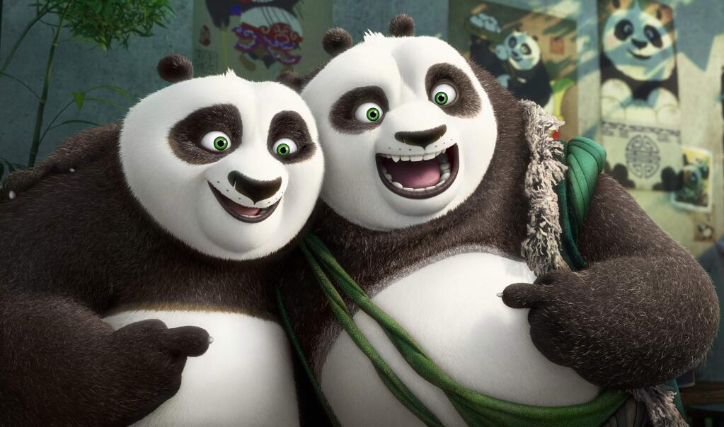This image released by DreamWorks Animation shows characters Po, voiced by Jack Black, left, and his long-lost panda father Li, voiced by Bryan Cranston, in a scene from 'Kung Fu Panda 3.' (DreamWorks Animation via AP)