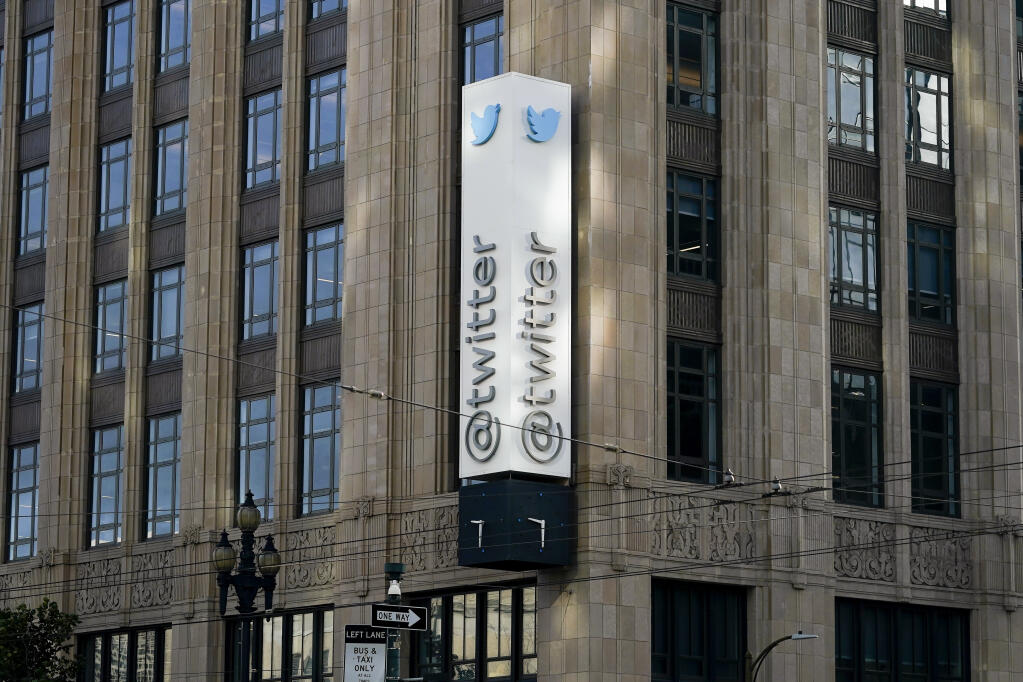 FILE - Twitter headquarters is shown in San Francisco on Nov. 4, 2022. Twitter said Tuesday, Nov. 8, that it will add a gray “official” label to some high-profile accounts to indicate that they are authentic, the latest twist in new owner Elon Musk’s chaotic overhaul of the platform’s verification system. (AP Photo/Jeff Chiu, File)