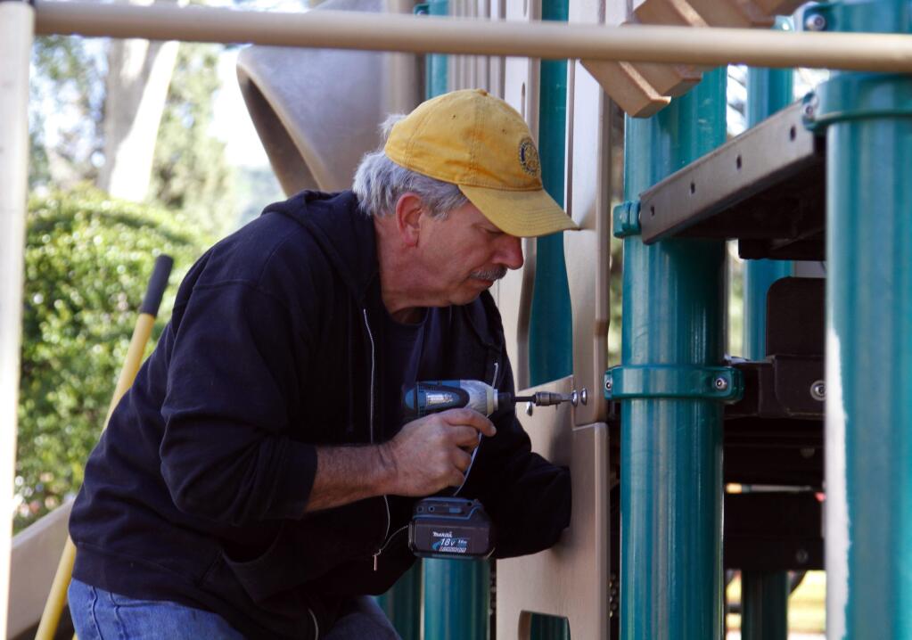 Bill Hoban/Index-TribuneA new look for a playgroundRich Lee puts screws into a climbing structure on the playground on the northwest corner of the Plaza. Lee was one of the numerous members of the Rotary Club of Sonoma Valley who refurbished the playground on Saturday. The club built the original playground in 1950, and has updated it through the years. More photos are on A3 and at sonomanews.com