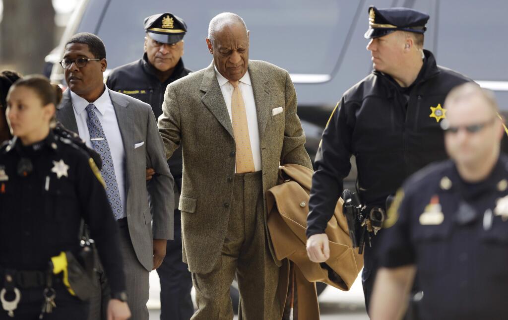 Bill Cosby, center, arrives for his sexual assault trial, Thursday, April 12, 2018, at the Montgomery County Courthouse in Norristown, Pa. (AP Photo/Matt Slocum)