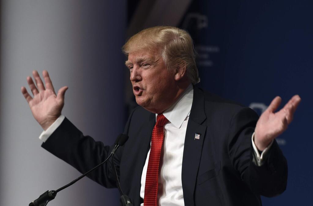 In this Dec. 3, 2015, photo, Republican presidential candidate Donald Trump speaks at the Republican Jewish Coalition Presidential Forum in Washington. Trump says he is calling for a 'complete and total shutdown' on Muslims entering the United States. Trump says in a statement released by his campaign Dec. 7 that his proposal comes in response to the level of hatred among 'large segments of the Muslim population' toward Americans. (AP Photo/Susan Walsh)