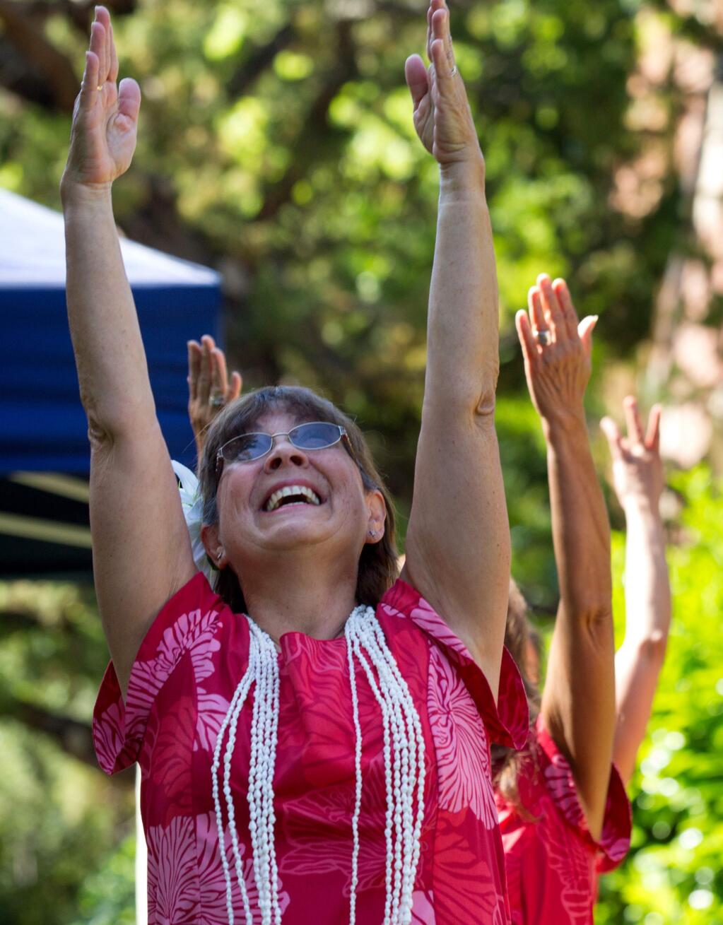 Linda Green of Sonoma dances with Hula Dancers of Sonoma, at the fourth Annual May Day Aloha Festival, held during the annual Day Under the Oaks, at Santa Rosa Junior College, in Santa Rosa Sunday, May 7, 2017. (Photo by Darryl Bush / For The Press Democrat)