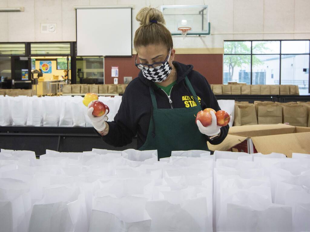 School district employees bagged over 1,000 breakfast and lunch combos in the high school's multipurpose room every weekday.T he lunch bags were available during weekdays at schools around the valley for anyone under 18 years old.