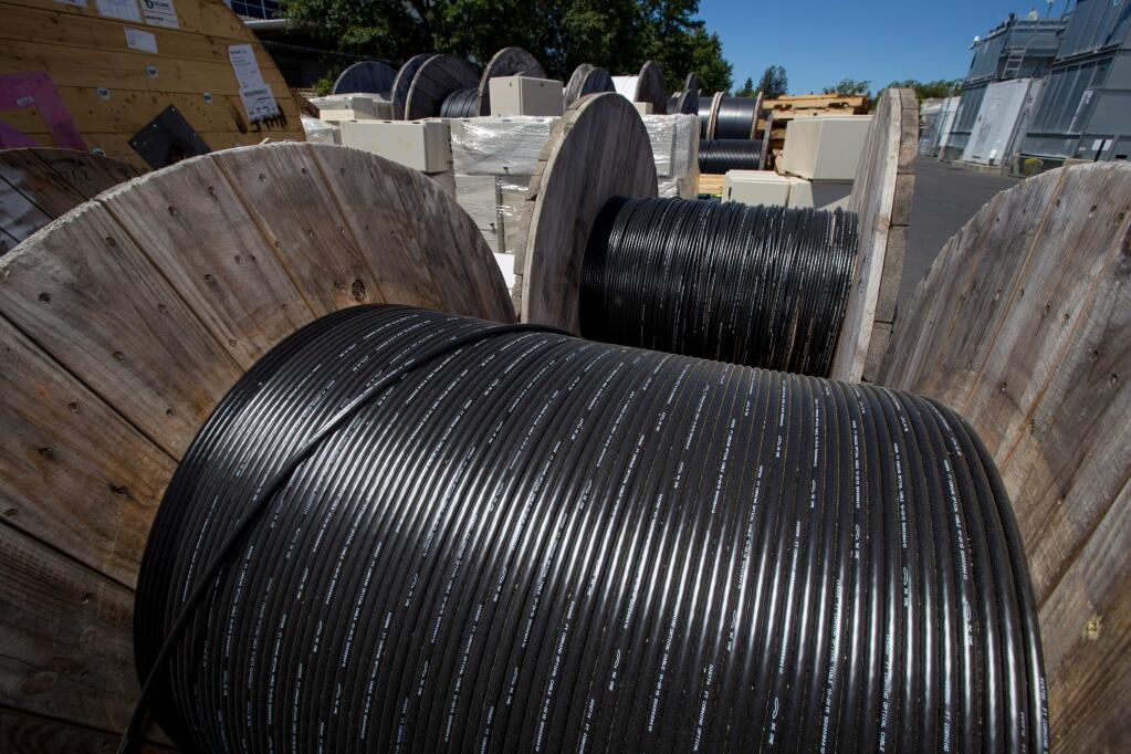 Fiber optic cable is held on giant spools ready for transport at Sonic headquarters In Santa Rosa in 2017. (Photo by Darryl Bush / For The Press Democrat)