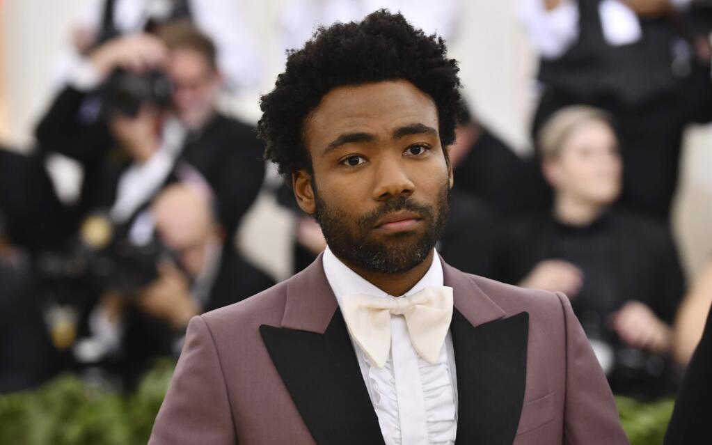 Donald Glover attends The Metropolitan Museum of Art's Costume Institute benefit gala celebrating the opening of the Heavenly Bodies: Fashion and the Catholic Imagination exhibition on Monday, May 7, 2018, in New York. (Photo by Charles Sykes/Invision/AP)