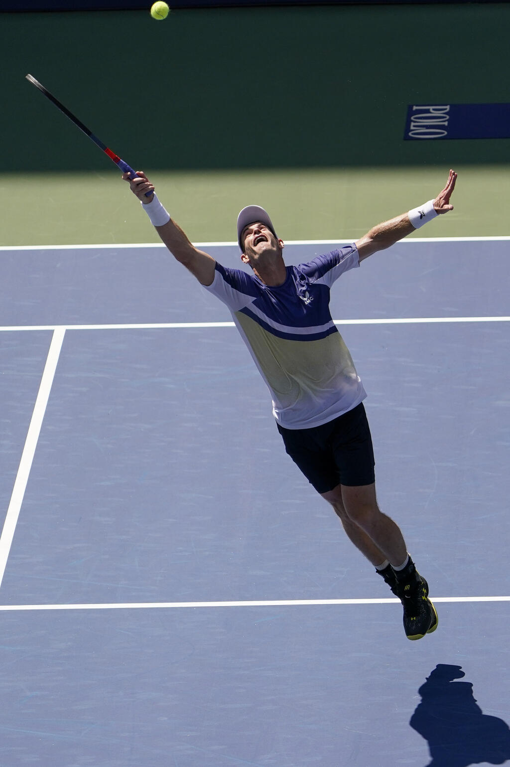 Andy Murray, of Great Britain, reaches for a shot from Francisco Cerundolo, of Argentina, during the first round of the US Open tennis championships, Monday, Aug. 29, 2022, in New York. (AP Photo/Seth Wenig)