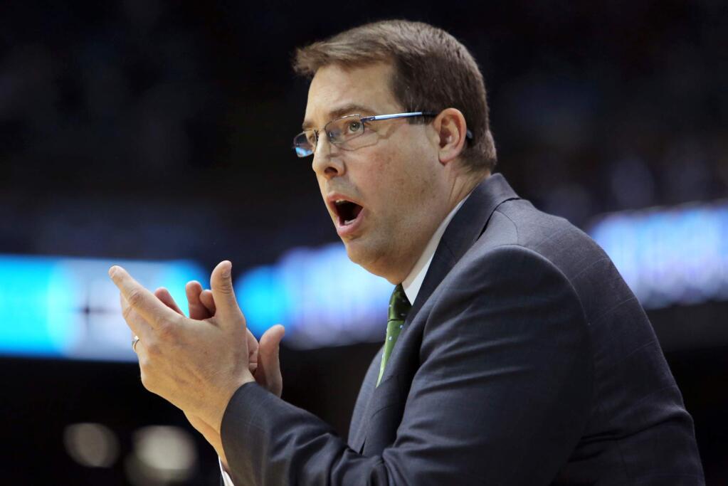FILE - In this Dec. 1, 2012 file photo, UAB head coach Jerod Haase encourages his players during the first half of an NCAA college basketball game against North Carolina in Chapel Hill, N.C. Stanford hired Haase as its new basketball coach on Friday, March 25, 2016, a week and a half after firing eighth-year coach Johnny Dawkins. (AP Photo/Ted Richardson, File)