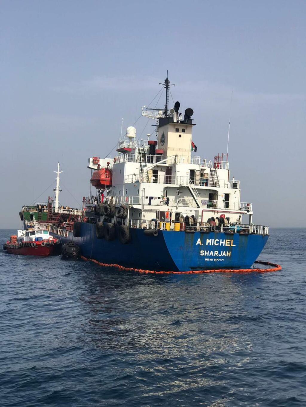 This photo provided by the United Arab Emirates' National Media Council shows the Emirati-flagged bunkering tanker A. Michel off the coast of Fujairah, United Arab Emirates, Monday, May 13, 2019. Two Saudi oil tankers and a Norwegian-flagged vessel were damaged in what Gulf officials described Monday as a 'sabotage' attack off the coast of the United Arab Emirates. While details of the incident remain unclear, it raised risks for shippers in a region vital to global energy supplies at a time of increasing tensions between the U.S. and Iran over its unraveling nuclear deal with world powers. (United Arab Emirates National Media Council via AP)