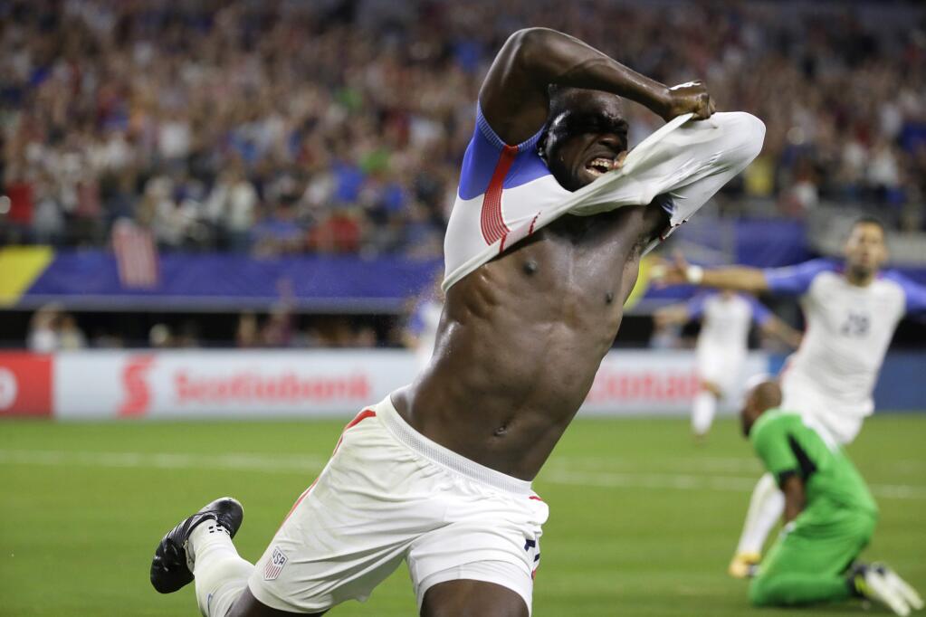 United States' Jozy Altidore celebrates after scoring against Costa Rica during a CONCACAF Gold Cup semifinal soccer match in Arlington, Texas, Saturday, July 22, 2017. (AP Photo/LM Otero)
