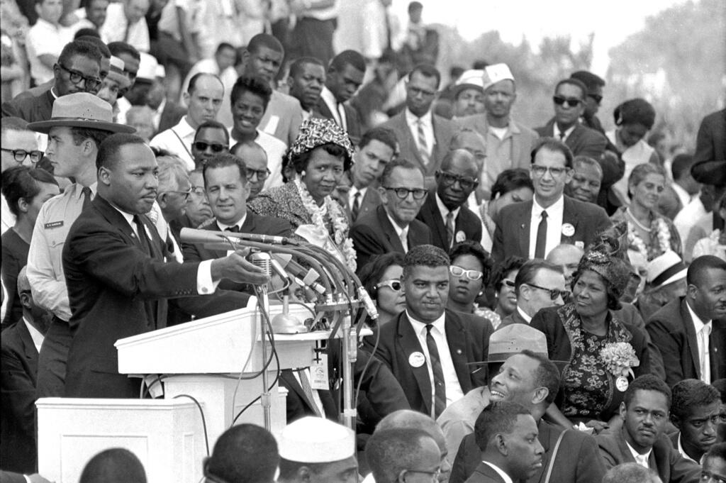 The Rev. Martin Luther King Jr. delivers his "I Have a Dream" speech in front of the Lincoln Memorial during the March on Washington on Aug. 28, 1963. Actor-singer Sammy Davis Jr. is at bottom right. (Associated Press)