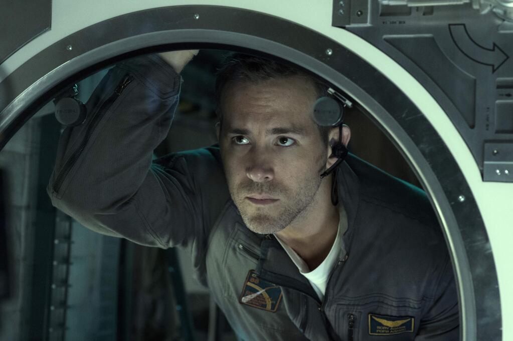 In this image released by Columbia Pictures, Ryan Reynolds appears in a scene from, 'Life.' (Alex Bailey/Columbia Pictures-Sony via AP)