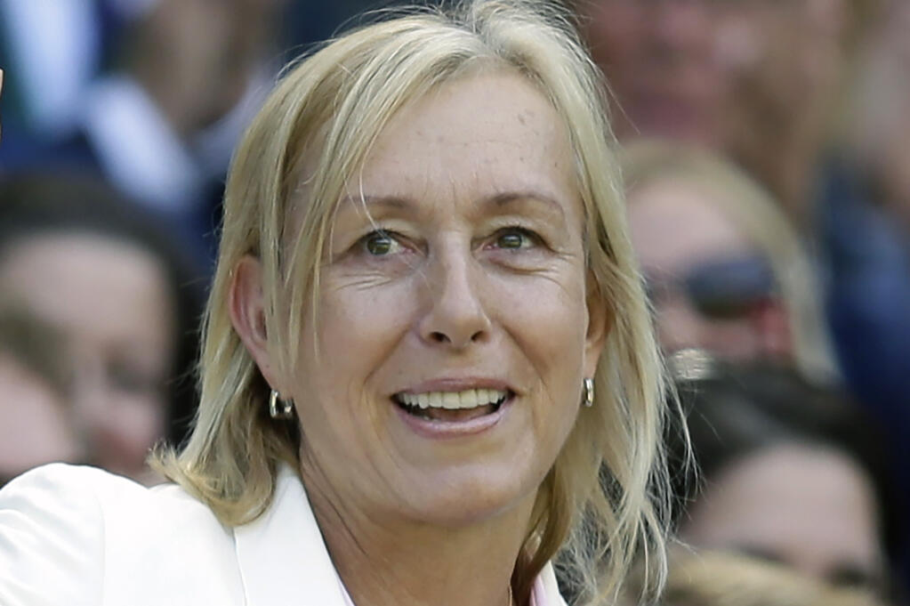 FILE - Tennis great Martina Navratilova is shown in the royal box on Centre Court at the All England Lawn Tennis Championships in Wimbledon, London, Saturday July 4, 2015. Navratilova said Monday, Jan. 2, 2023, that she has been diagnosed with throat cancer and breast cancer. In a statement released by her representative, the 18-time Grand Slam singles champion and member of the International Tennis Hall of Fame said her prognosis is good and she will start treatment this month. (AP Photo/Tim Ireland, File)