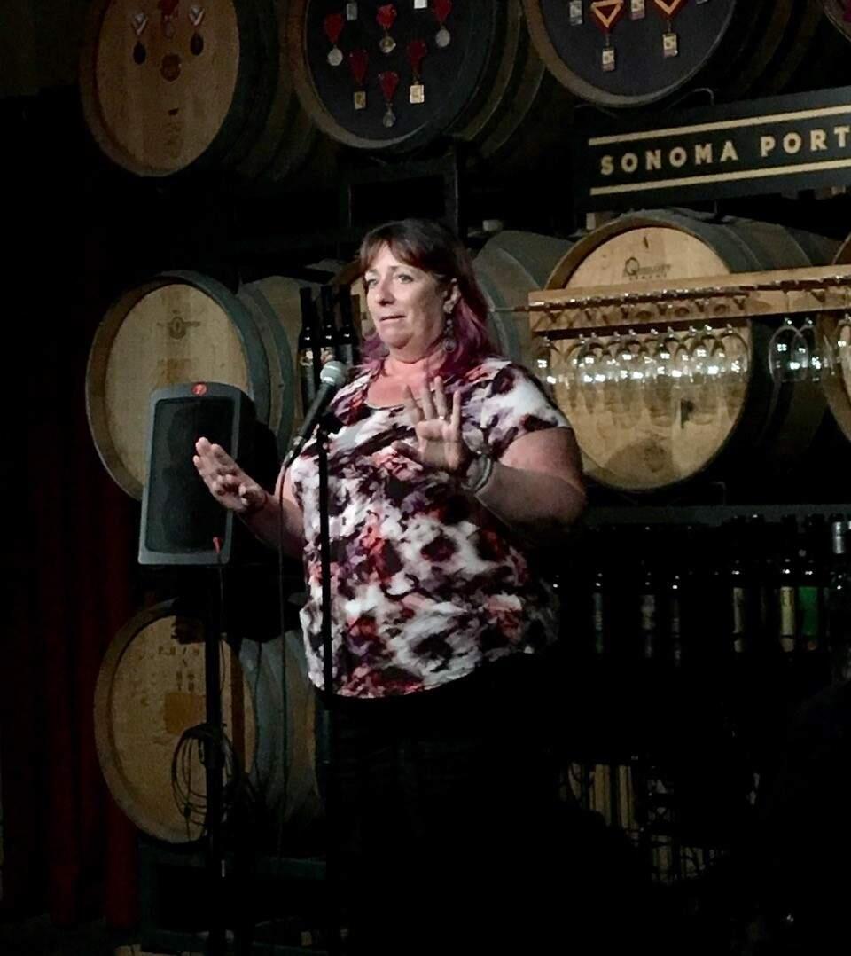 Claire Hennessy, delivering her first place winning story at last week's West Side Stories, at Sonoma Port Works, in Petaluma.