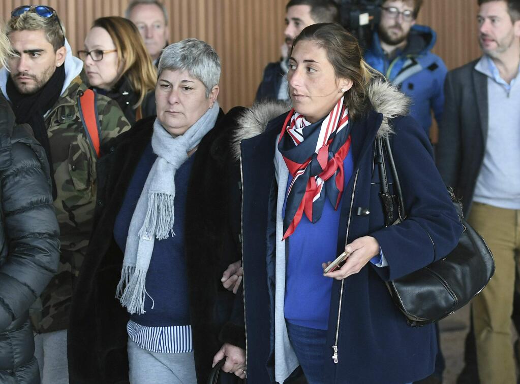 Emiliano Sala's mother Mercedes, left and sister Romina right, arrive back at Guernsey airport after taking a flight to view the area of the English Channel in which the missing footballers plane was last seen, in Gurernsey, England, Monday, Jan. 28, 2019. Authorities said on Thursday they were no longer searching for the plane after a three-day air-and-sea operation near the Channel Islands failed to locate the aircraft, Argentine striker Sala or pilot David Ibbotson. A private search organised by the family has begun. (Joe Giddens/PA via AP)