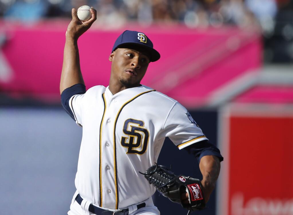 San Diego Padres starting pitcher Luis Perdomoin throws against the San Francisco Giants in the first inning of a baseball game Saturday, July 16, 2016, in San Diego. (AP Photo/Lenny Ignelzi)