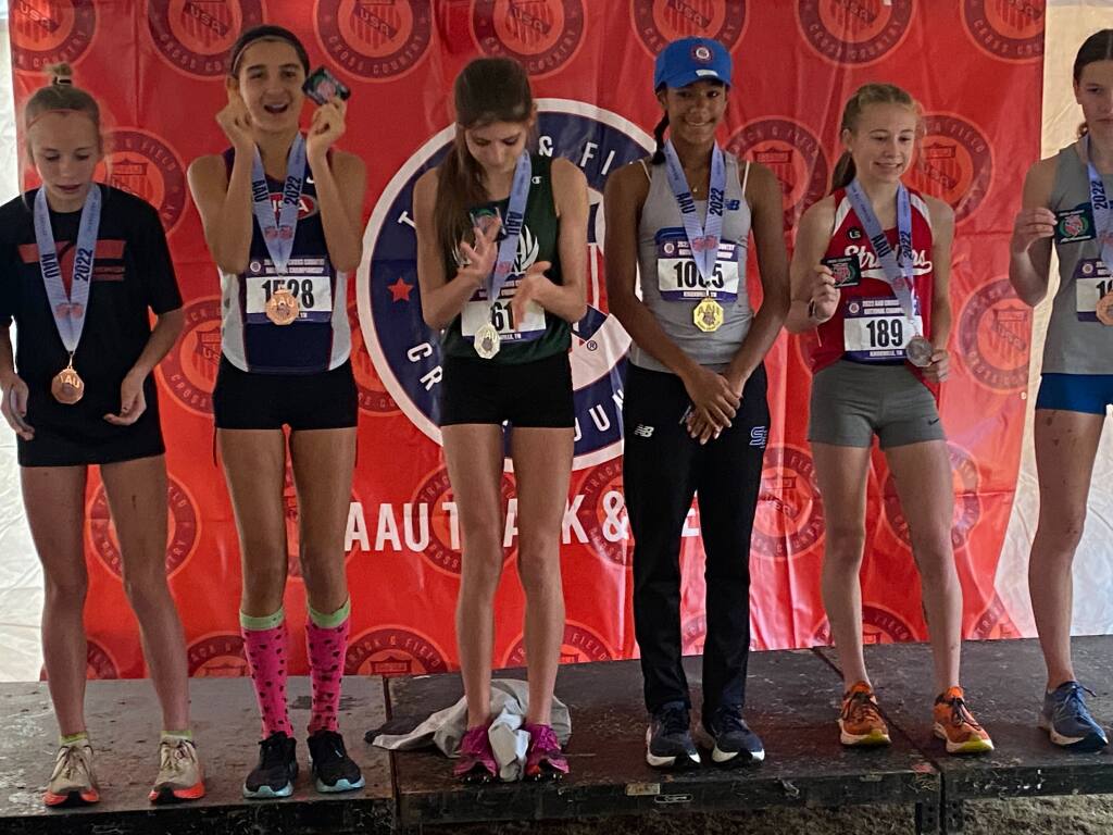 Santa Rosa’s Ashlin Mallon, second from left, finished fourth among all 13-year-olds in the American Athletic Union’s national cross-country championships last week in Tennessee. (Julia Stamps Mallon)