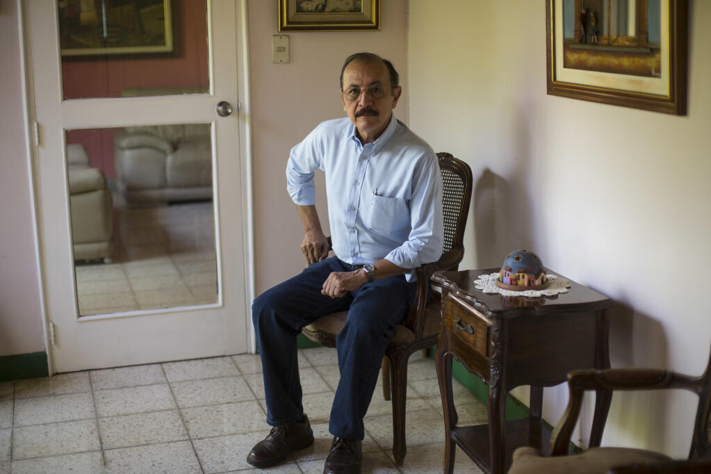 Retired Sandinista Gen. Hugo Torres poses for portrait at his home, in Managua, Nicaragua, May 2, 2018. The former Sandinista guerrilla leader and opposition politician died in prison at the age of 73, relatives said Saturday, Feb. 12, 2022. Torres was the first of a large group of opposition leaders rounded up in a 2021 crackdown to die; it was unclear if his death was hastened by conditions in prison. (AP Photo/Moises Castillo, File)