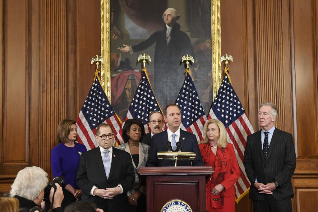 From left, House Speaker Nancy Pelosi, House Judiciary Committee Chairman Jerrold Nadler, D-N.Y., Chairwoman of the House Financial Services Committee Maxine Waters, D-Calif., Chairman of the House Foreign Affairs Committee Eliot Engel, D-N.Y., Chairman of the House Permanent Select Committee on Intelligence Adam Schiff, D-Calif., Chairwoman of the House Committee on Oversight and Reform Carolyn Maloney, D-N.Y., and House Ways and Means Chairman Richard Neal, unveil articles of impeachment against President Donald Trump, during a news conference on Capitol Hill in Washington, Tuesday, Dec. 10, 2019.(AP Photo/Susan Walsh)