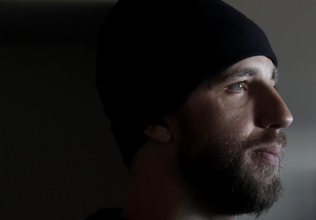 In this Feb. 9, 2018 photo, San Francisco Giants pitcher Madison Bumgarner is interviewed during the team's media day in San Francisco. Bumgarner is in the best shape of his life ready for the bounce-back season after a most forgettable one for San Francisco's big lefty ace. (AP Photo/Jeff Chiu)