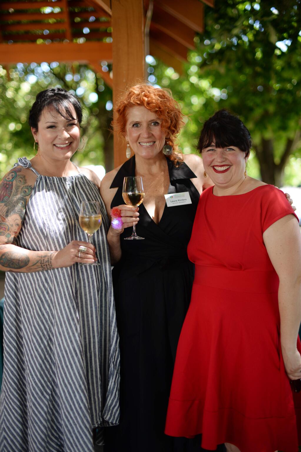 From left, Bonnie Headley, Laura Kimbro and Liza Hinman during Wine Women & Shoes event held Saturday at Clos Du Bois Winery in Geyserville, California. The event benefits Healthcare Foundation Northern Sonoma County. June 23, 2018.(Photo: Erik Castro/for The Press Democrat)
