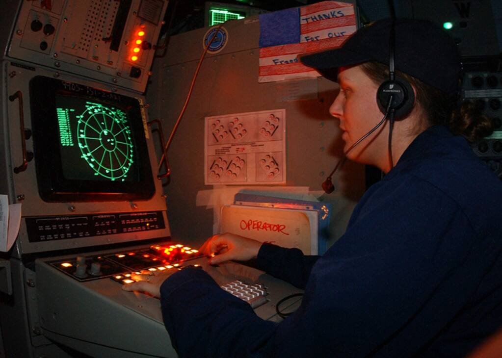 030323-N-3181R-003Arabian Gulf (Mar. 23, 2003) -- Electronic Warfare Technician 2nd Class Nikol Ebert, from San Diego, Calif., watches for possible incoming missiles from the Combat Information Center aboard the amphibious assault ship USS Bonhomme Richard (LHD 6). Bonhomme Richard is conducting missions in support of Operation Iraqi Freedom. Operation Iraqi Freedom is the multi-national coalition effort to liberate the Iraqi people, eliminate Iraq's weapons of mass destruction, and end the regime of Saddam Hussein. U.S. Navy photo by Photographer's Mate 3rd Class Chris Reynolds. (RELEASED BY C5F PUBLIC AFFAIRS credit as U.S. Navy photo by Chris Reynolds)