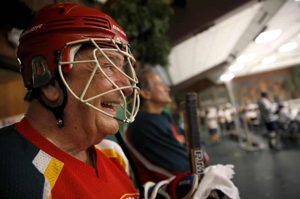 82-year-old Bob Santini of the New York Apple Core team from Long Beach, NY, waits to play during the Snoopy's 39th Annual Senior World Hockey Tournament at the Redwood Empire Ice Arena in Santa Rosa, on Monday, July 14, 2014. (BETH SCHLANKER/ The Press Democrat)