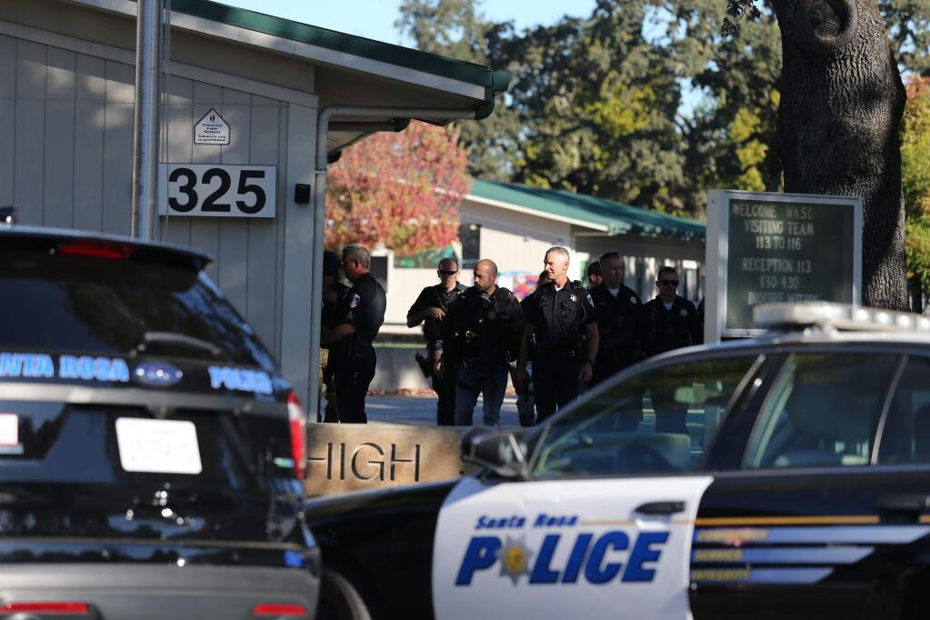 Police search for the suspect in a shooting near Ridgway High School in Santa Rosa on Tuesday, Oct. 22, 2019. (BETH SCHLANKER/ PD)