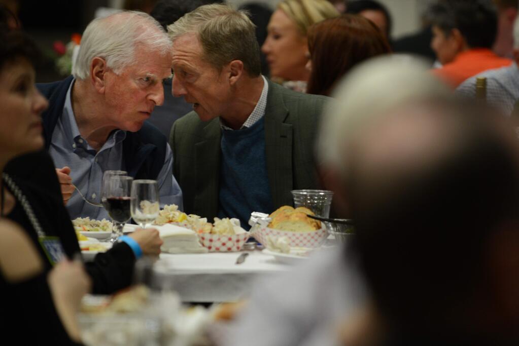 U.S. Congressman Mike Thompson, left, chatting with keynote speaker Tom Steyer during the Sonoma County Democratic Party 29th Annual Crab Feed held at the Santa Rosa Veterans Memorial Building Friday, February 24, 2017.(Photo: Erik Castro/for The Press Democrat)