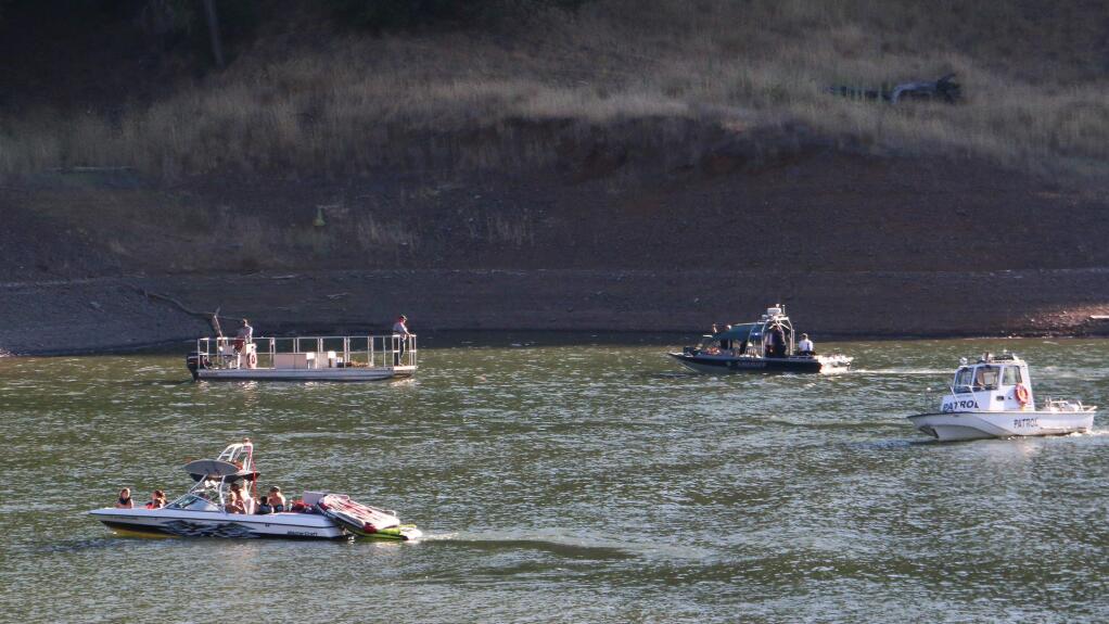 Crews search for a 14-year-old boy who went missing at Lake Sonoma on Saturday, July 4, 2015, after falling off an inner tube. (Photo by Kevin Reyes)