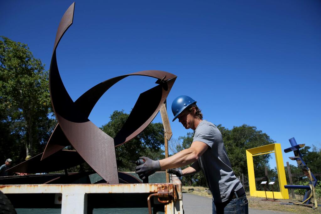 Petaluma sculptor Sean Paul Lorentz prepares his sculpture titled 'Blue' to be unloaded and installed at Paradise Ridge Winery. Photo taken in Santa Rosa, Calif., on Tuesday, June 16, 2020. (BETH SCHLANKER/ The Press Democrat)