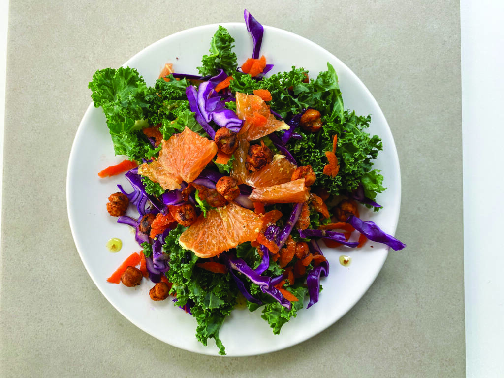 A client from the Healing Meals Community Project in Bloomfield, Illinois, contributed a recipe for Citrus Burst Kale Salad with Spiced Chickpeas to the “Nourishing Community” cookbook from Ceres Community Project of Sebastopol. (Felicity Crush)