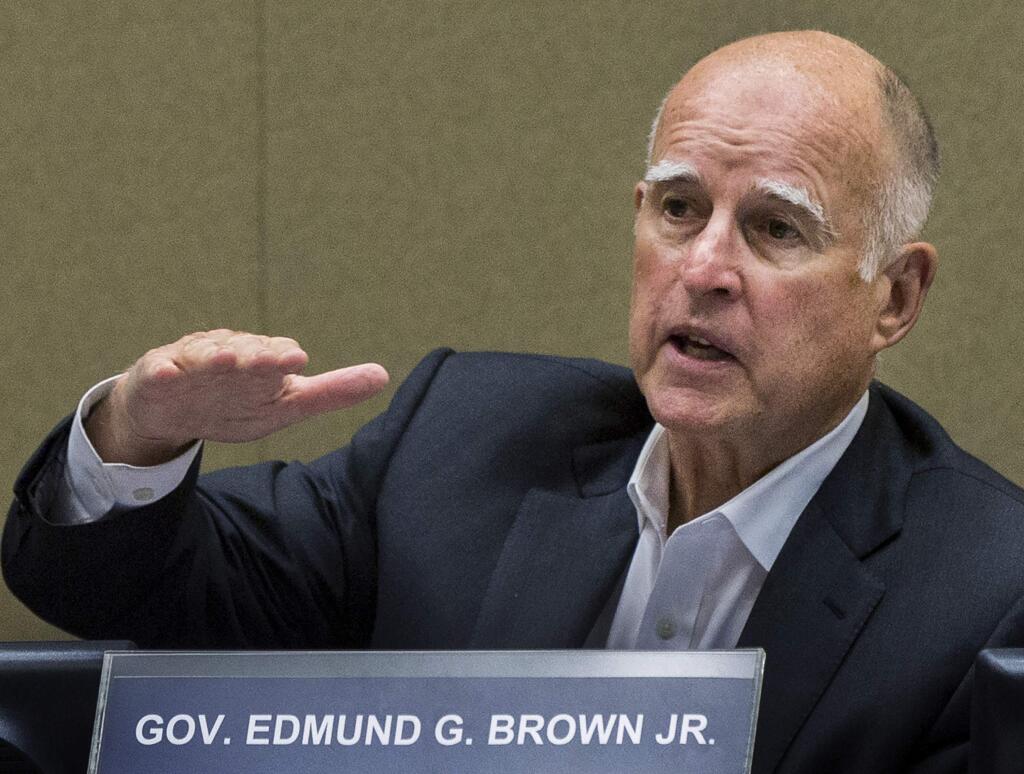 Gov. Jerry Brown signed a law making California the fifth state to allow physician-assisted suicide. (DAMIAN DOVARGANES / Associated Press)
