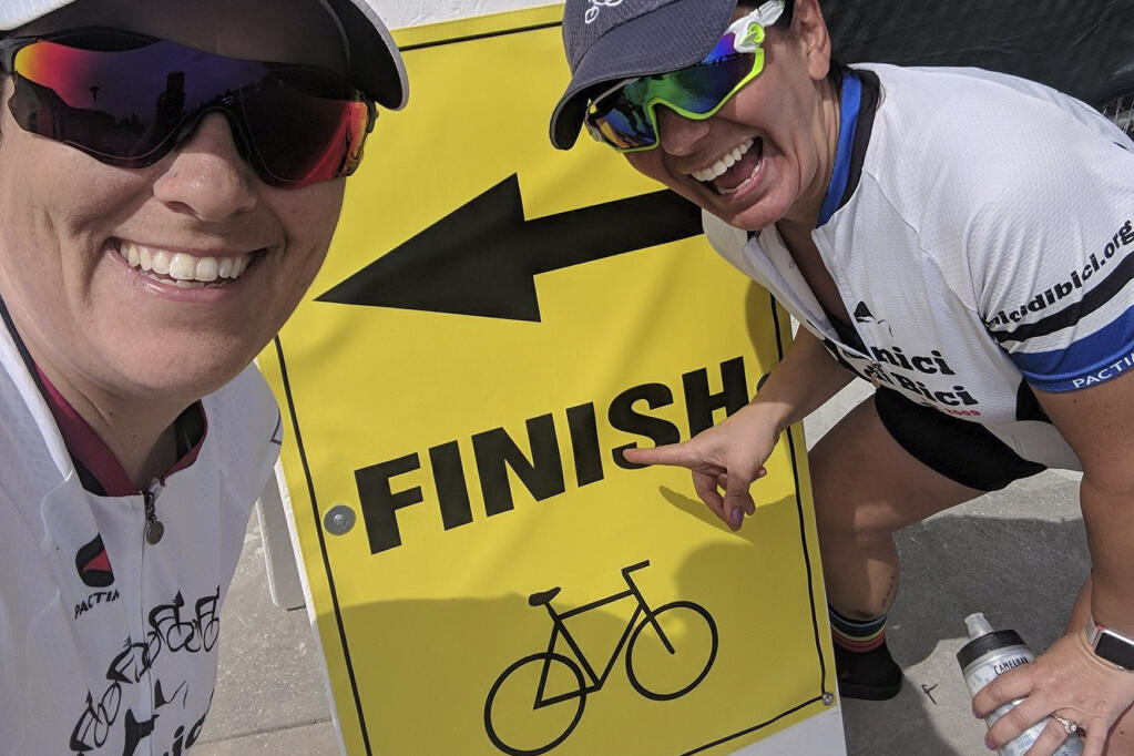Riding for a Cause: Jennifer Benedetti and Sheeda Ferguson – happy after 100 miles!