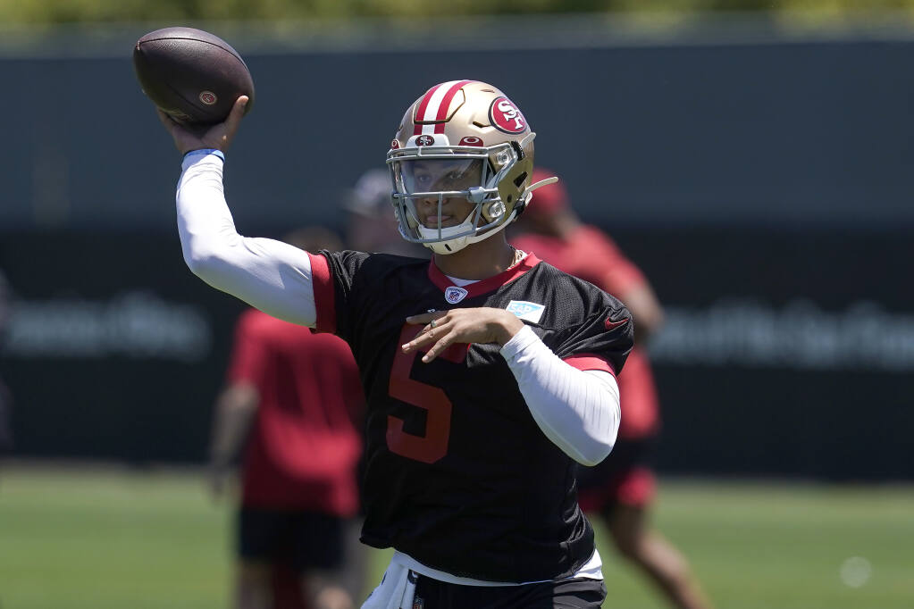 San Francisco 49ers quarterback Trey Lance takes part in drills at the team’s practice facility in Santa Clara on Tuesday, May 24, 2022. (Jeff Chiu / ASSOCIATED PRESS)