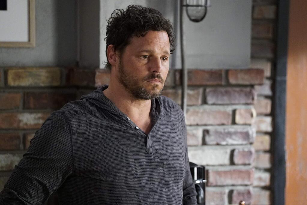 This image released by ABC shows Justin Chambers in a scene from 'Grey's Anatomy.' Chambers, who played Alex Karev on the show, left last season after a 15-year run. (Kelsey McNeal/ABC via AP)
