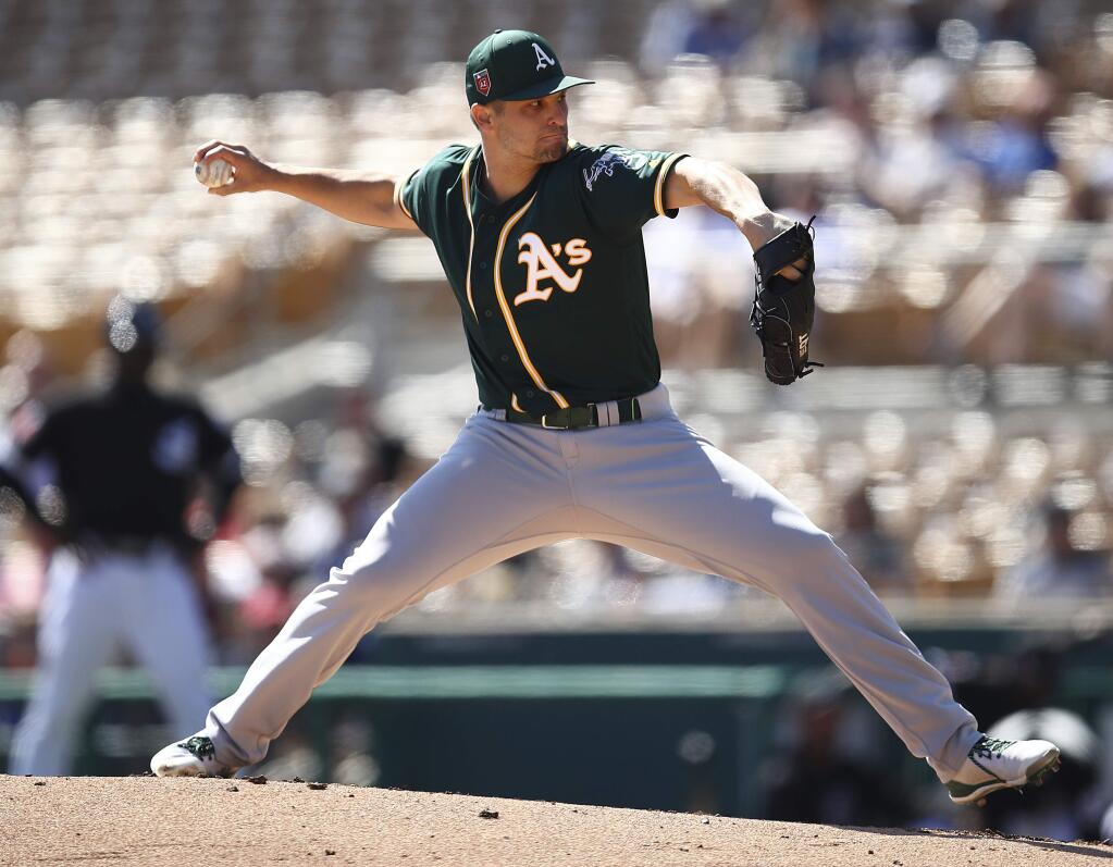 Oakland Athletics pitcher Kendall Graveman works against the Chicago White Sox during the first inning on Monday, Feb. 26, 2018, in Glendale, Ariz. (AP Photo/Ben Margot)