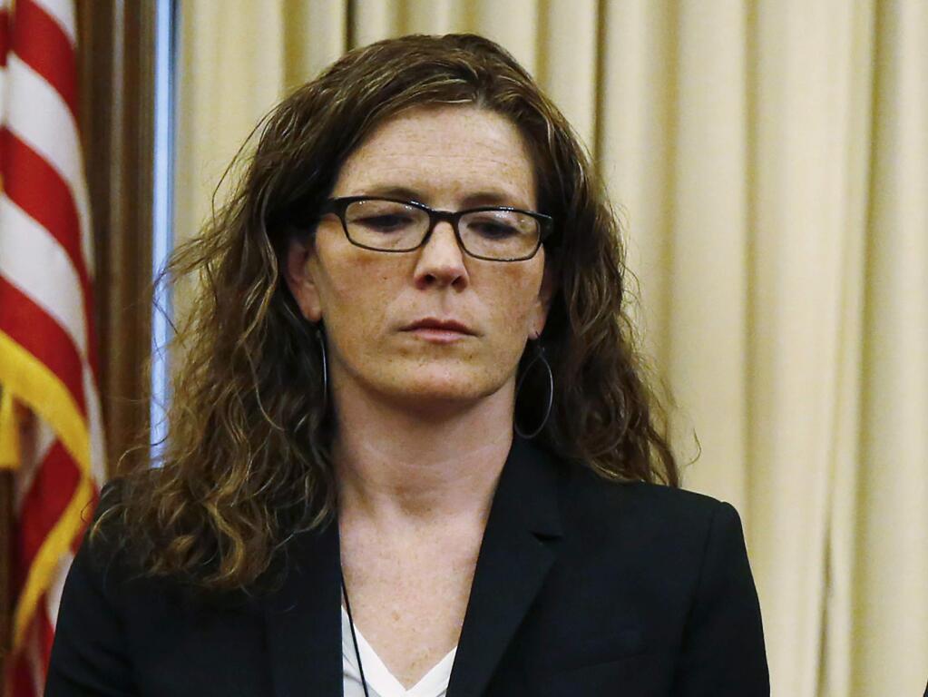 FILE - This May 19, 2016, file photo, shows Suzy Loftus, then president of the Police Commission during a news conference at City Hall in San Francisco. San Francisco authorities recovered about $2 million in suspected stolen electronics and clothing during a bust of what they called a sophisticated fencing operation, the district attorney's office announced Thursday, Dec. 12, 2019. Interim District Attorney Loftus said in a statement that organized fencing operations are fueling San Francisco's notoriously high property crime rate and that disrupting the market for stolen goods should reduce the incentive to steal. (Connor Radnovich/San Francisco Chronicle via AP, File)