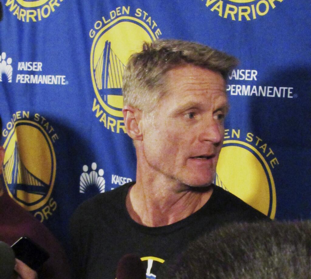 Golden State Warriors coach Steve Kerr speaks to reporters at the team hotel in Portland, Ore., Sunday, April 23, 2017. Kerr announced he won't be on the sidelines for the NBA basketball team's Game 4 playoff game against the Portland Trail Blazers on Monday night. (AP Photo/Anne Peterson)