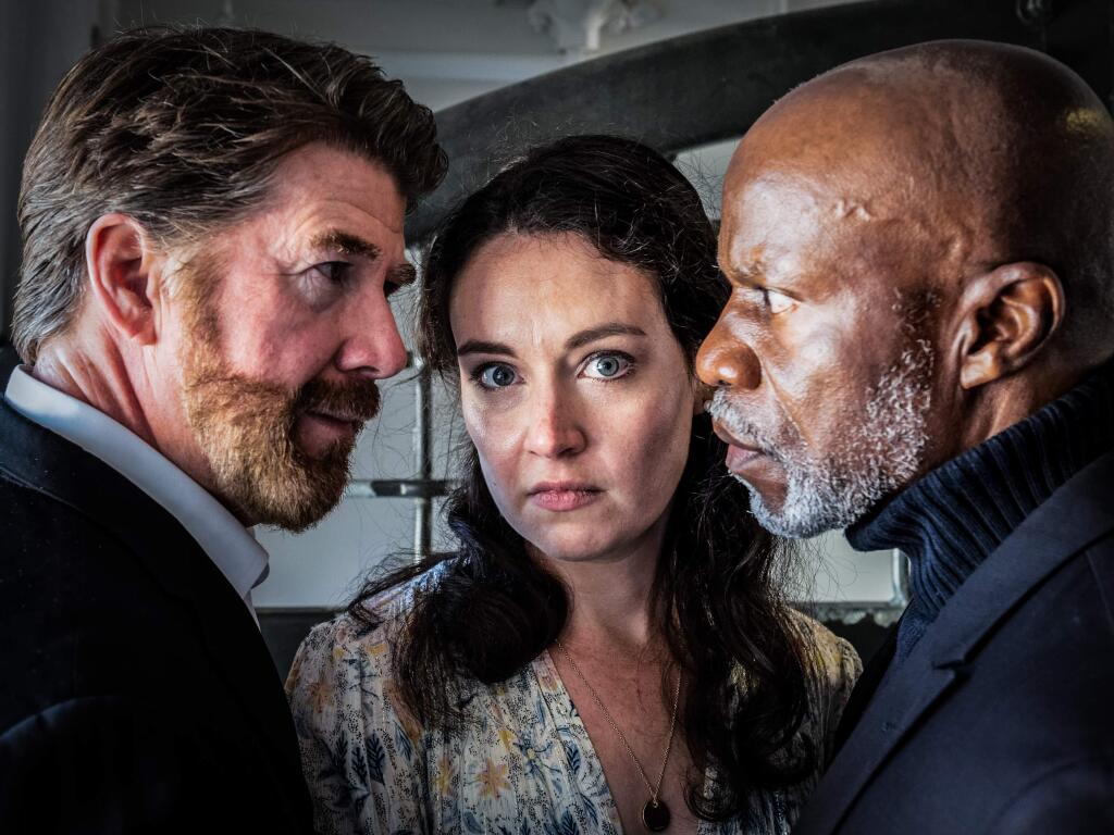 JORDAN DOES SHAKESPEARE: Iago (Michael Ray Wisely), Desdemona (Isabel Siragusa), and Othello (L. Peter Callender) in African-American Shakespeare Companyís production of ëOthelloí directed by Petaluma's Carl Jordan. Photo credit: Lance Huntley