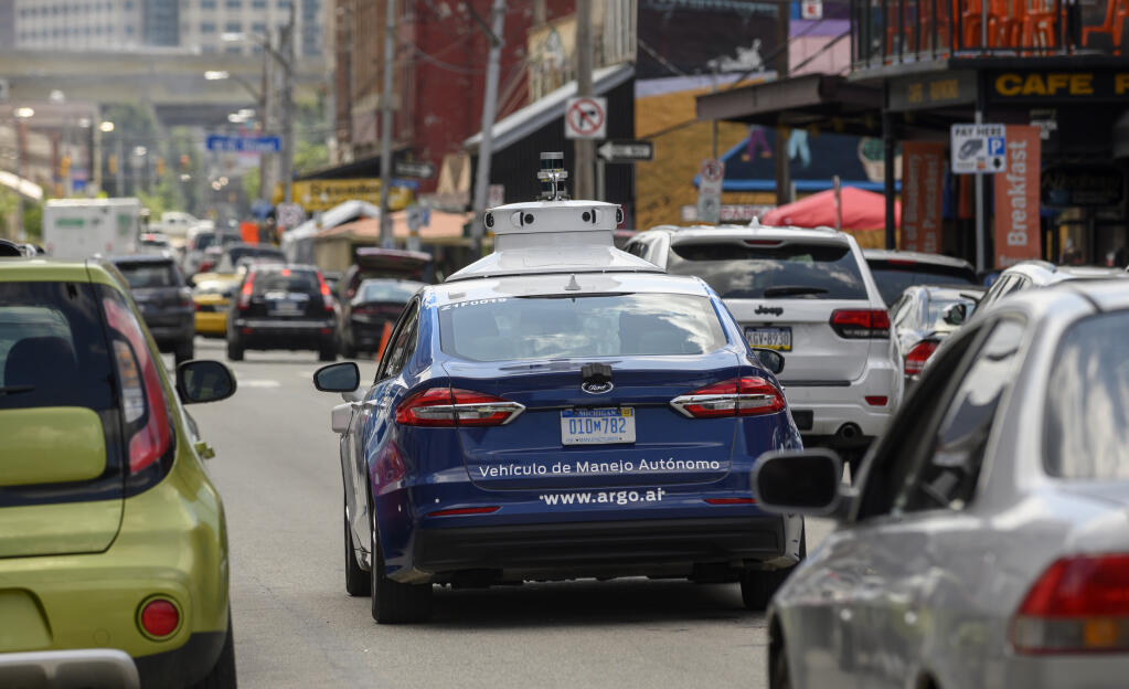 A self-driving car in Pittsburgh. Legislation in California would allow police to ticket operators of autonomous vehicles that violate traffic laws. (JEFF SWENSEN / New York Times, 2019)