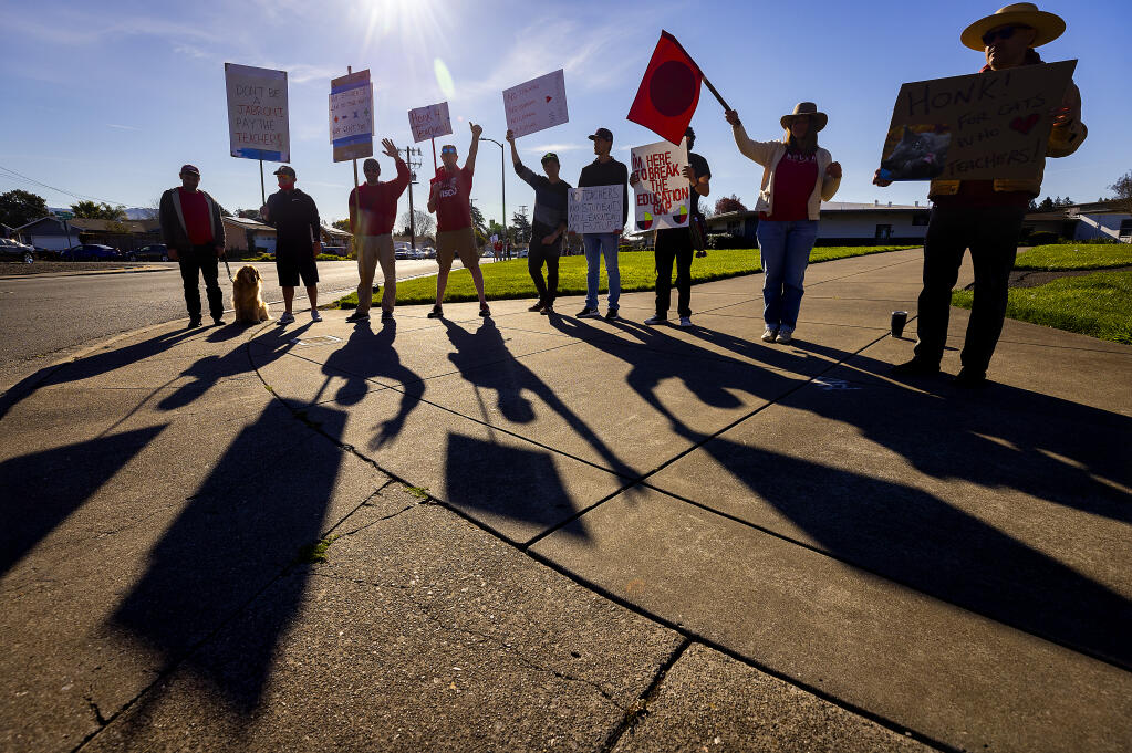 Teachers from Technology Middle School protest for higher wages on the second day of the strike in Rohnert Park on Friday, March 11, 2022. (John Burgess/The Press Democrat